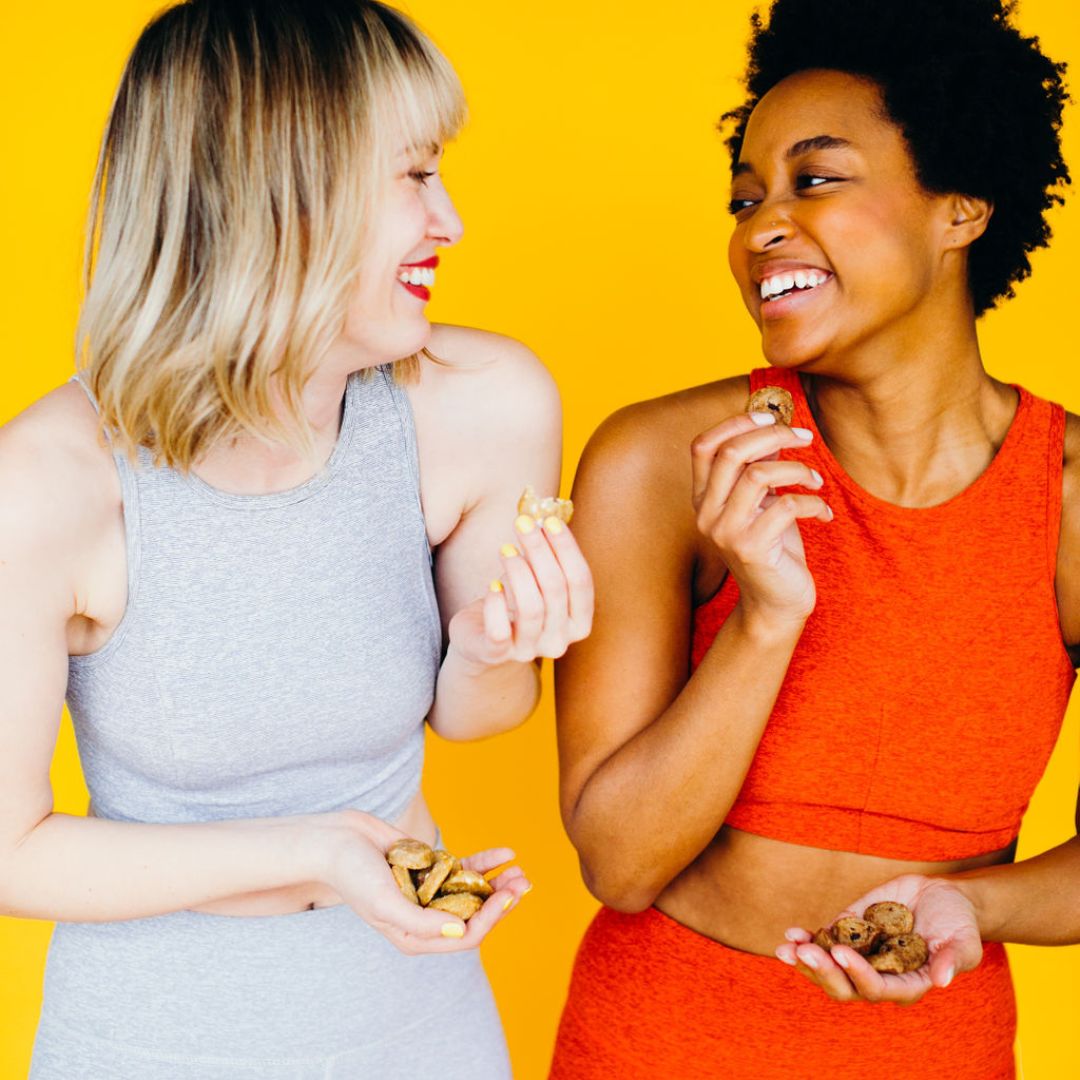 Women enjoying Rule Breaker Snacks Bites